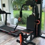 Multigimnasio con 75 kg de pesas con banco scott